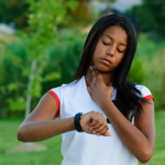 A woman checking her pulse